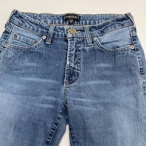 BEBE Women’s 29 Tall fit like a 6 Faded Bootcut Blue Jeans. Inseam is 32.